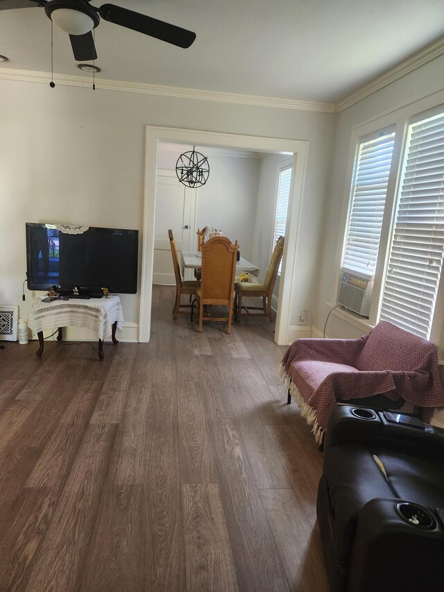 2611 Longfellow Ave, Minneapolis, MN 55407 - living area with wood finished floors, ceiling fan, ornamental molding, and cooling unit