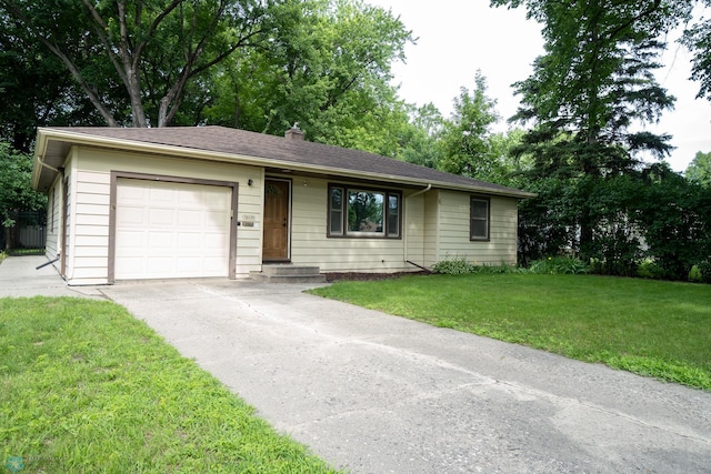 1606 5th St N, Fargo, ND 58102 - ranch-style home with a garage, concrete driveway, a front lawn, and a chimney