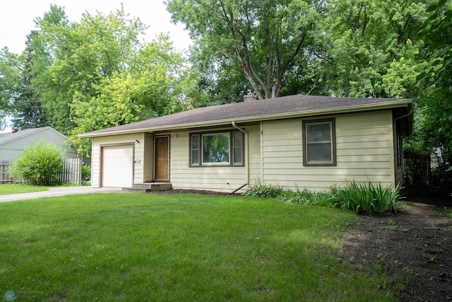 1606 5th St N, Fargo, ND 58102 - ranch-style home with a garage, a front lawn, and asphalt driveway