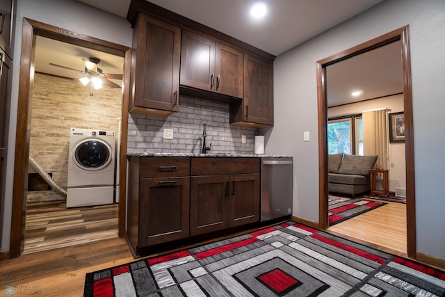 1606 5th St N, Fargo, ND 58102 - kitchen with washer / clothes dryer, dishwasher, wood finished floors, a ceiling fan, and dark brown cabinets