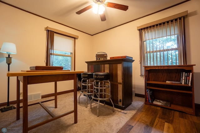 1606 5th St N, Fargo, ND 58102 - office space featuring crown molding, ceiling fan, a dry bar, and wood finished floors