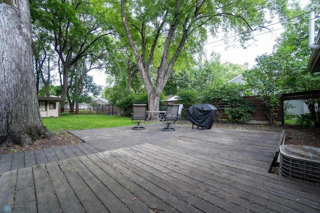 1606 5th St N, Fargo, ND 58102 - deck featuring a fenced backyard and a grill