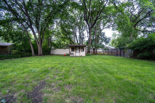 1606 5th St N, Fargo, ND 58102 - fenced backyard featuring an outdoor structure