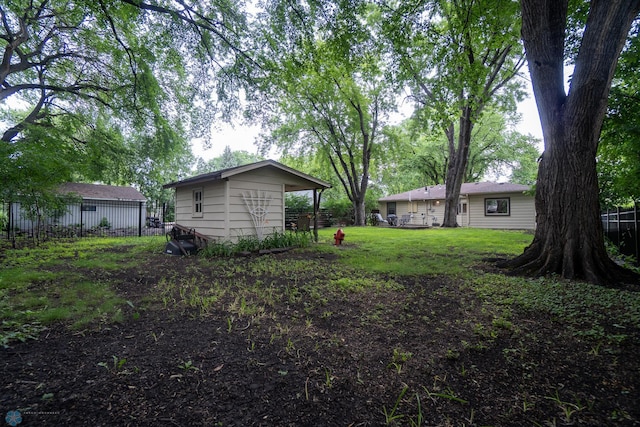 1606 5th St N, Fargo, ND 58102 - view of yard with an outbuilding