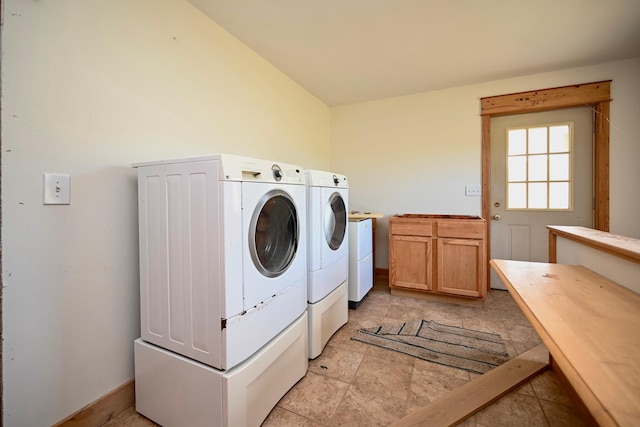 S3093 Baertsch Valley Rd, Cross Twp, WI 54629 - laundry area with separate washer and dryer and cabinet space