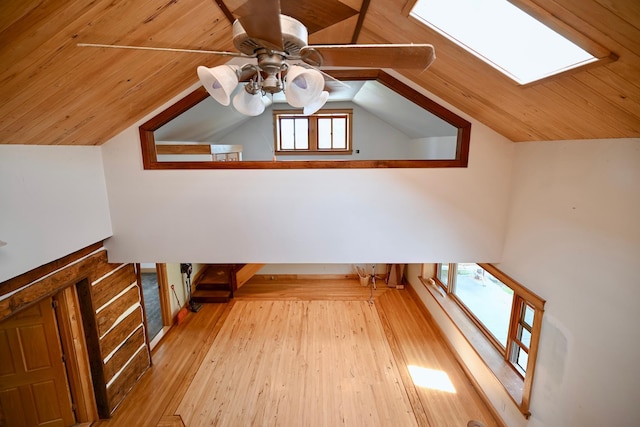 S3093 Baertsch Valley Rd, Cross Twp, WI 54629 - additional living space with ceiling fan, vaulted ceiling, wood finished floors, wooden ceiling, and a skylight
