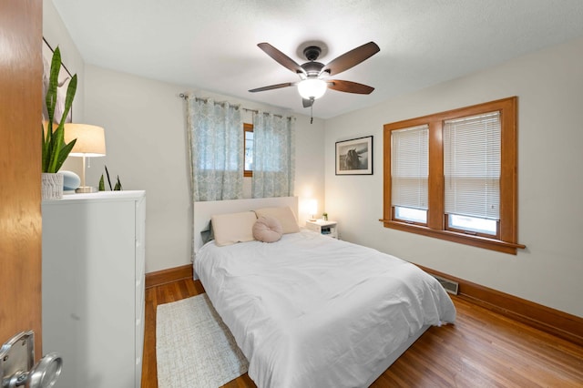 4334 Thomas Ave N, Minneapolis, MN 55412 - bedroom featuring wood finished floors and a ceiling fan