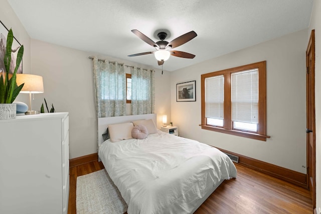 4334 Thomas Ave N, Minneapolis, MN 55412 - bedroom featuring wood finished floors and ceiling fan