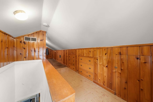 4334 Thomas Ave N, Minneapolis, MN 55412 - hallway featuring wooden walls and vaulted ceiling