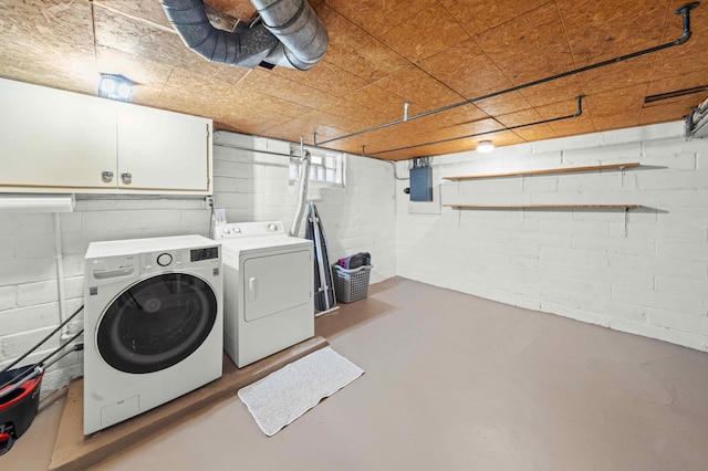 4334 Thomas Ave N, Minneapolis, MN 55412 - laundry area featuring washing machine and clothes dryer, cabinet space, and electric panel