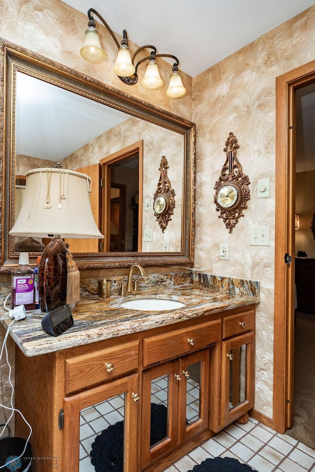 15 Fremont Dr S, Fargo, ND 58103 - bathroom featuring wallpapered walls, vanity, and tile patterned floors