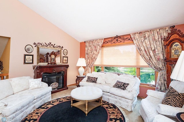 15 Fremont Dr S, Fargo, ND 58103 - living room featuring carpet flooring, vaulted ceiling, and a glass covered fireplace