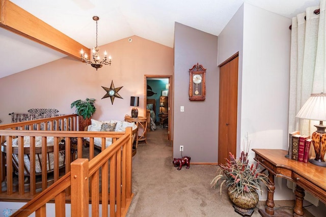 15 Fremont Dr S, Fargo, ND 58103 - hallway with a chandelier, vaulted ceiling, light carpet, and an upstairs landing