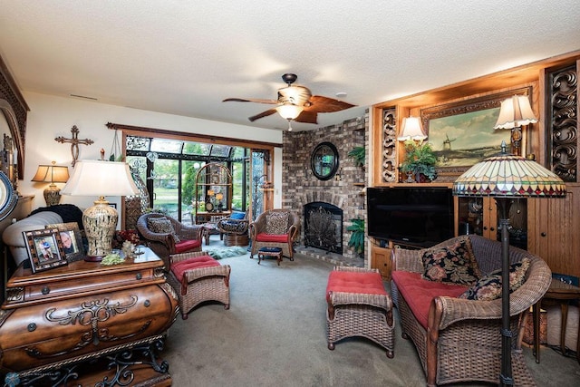 15 Fremont Dr S, Fargo, ND 58103 - carpeted living area with a ceiling fan, a textured ceiling, and a fireplace