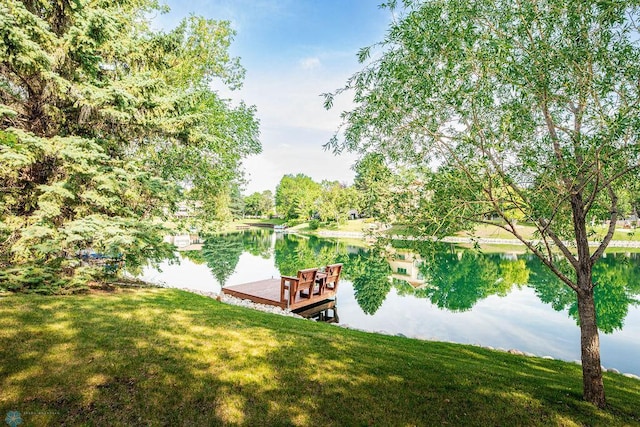 15 Fremont Dr S, Fargo, ND 58103 - dock area featuring a water view and a yard