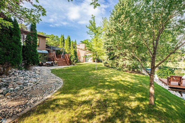 15 Fremont Dr S, Fargo, ND 58103 - view of grassy yard with a wooden deck