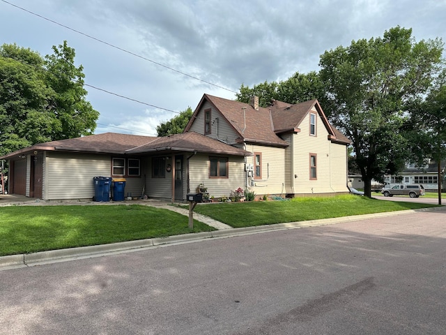 500 Main Ave, Lafayette, MN 56054 - view of front of house with a front yard and an attached garage