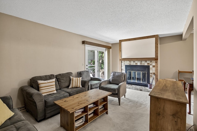 2365 Dorland Ln E, Maplewood, MN 55119 - living area with light carpet, a textured ceiling, and a glass covered fireplace