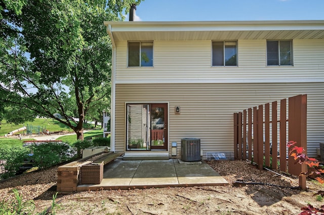2365 Dorland Ln E, Maplewood, MN 55119 - back of house with a patio area
