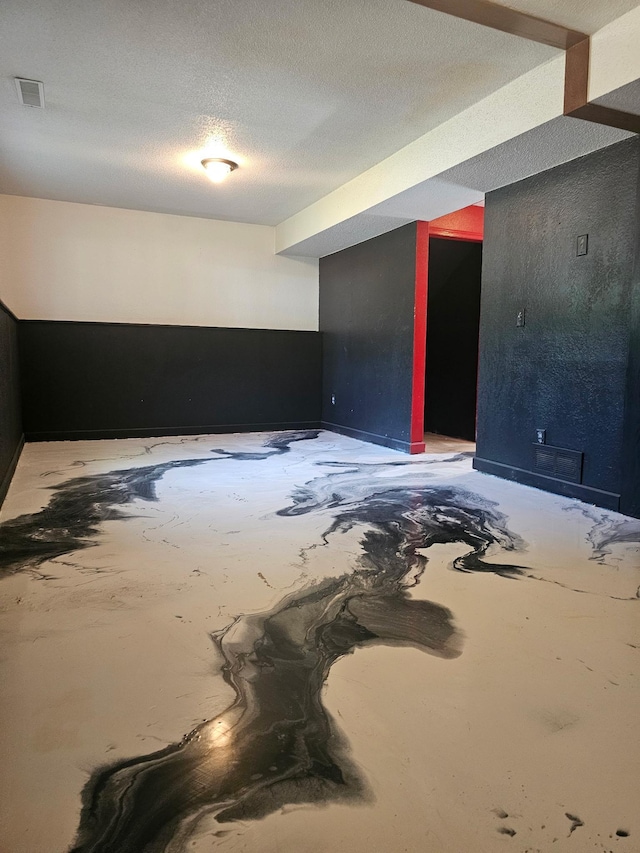 117 Quincy St, Alexandria, MN 56308 - below grade area featuring a textured ceiling