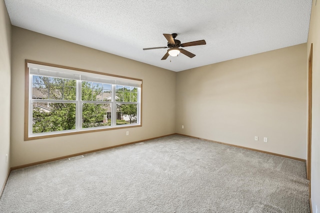 651 Ravencroft Rd, Waconia, MN 55387 - carpeted spare room featuring a ceiling fan and a textured ceiling