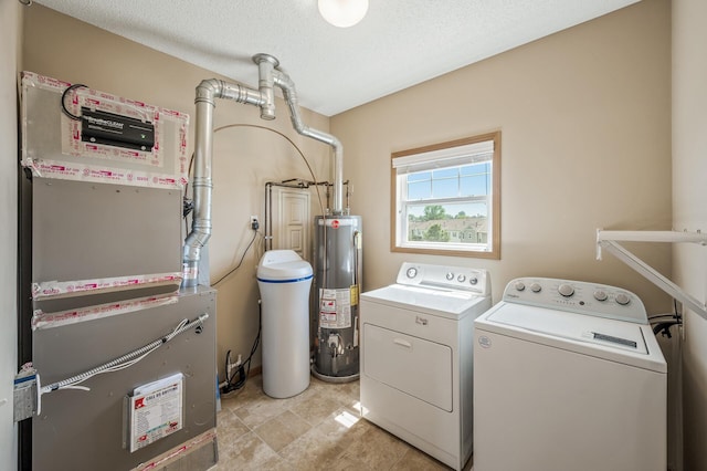 651 Ravencroft Rd, Waconia, MN 55387 - laundry room featuring independent washer and dryer, water heater, heating unit, and a textured ceiling