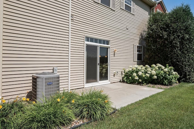 651 Ravencroft Rd, Waconia, MN 55387 - back of house featuring a patio area