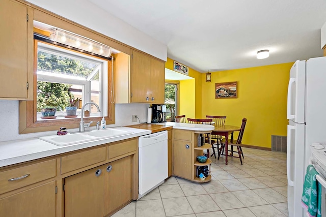 5501 30th Ave S, Minneapolis, MN 55417 - kitchen with white appliances, a peninsula, light countertops, light tile patterned floors, and open shelves