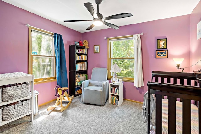 5501 30th Ave S, Minneapolis, MN 55417 - bedroom featuring carpet, multiple windows, and a ceiling fan