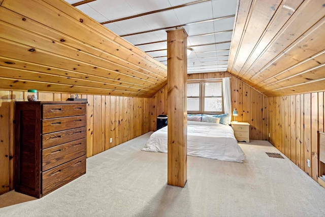 5501 30th Ave S, Minneapolis, MN 55417 - unfurnished bedroom with carpet floors, wooden walls, and vaulted ceiling