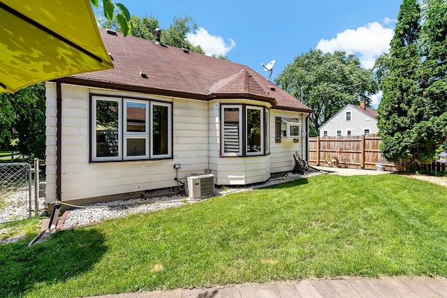 5501 30th Ave S, Minneapolis, MN 55417 - back of house featuring a shingled roof