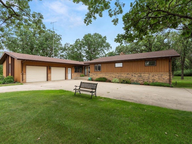 15170 141st Ave, Wadena, MN 56482 - view of front facade with driveway, a front lawn, a garage, and brick siding