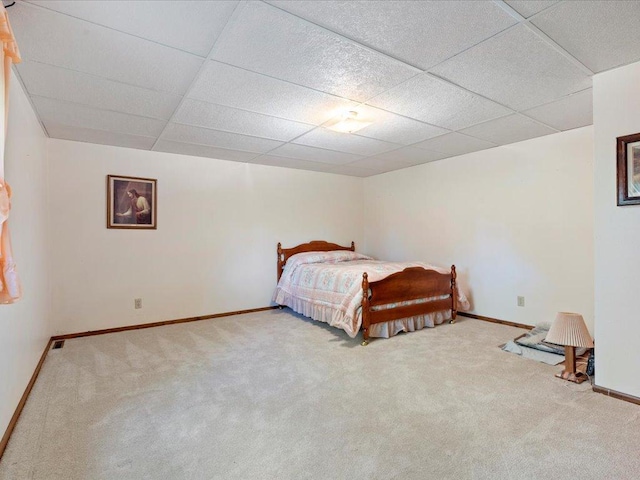 15170 141st Ave, Wadena, MN 56482 - carpeted bedroom featuring baseboards and a drop ceiling