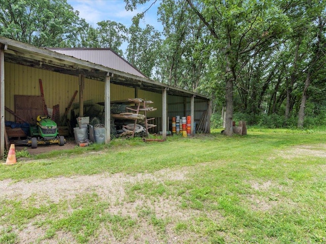 15170 141st Ave, Wadena, MN 56482 - view of green lawn with a pole building, a carport, and an outbuilding