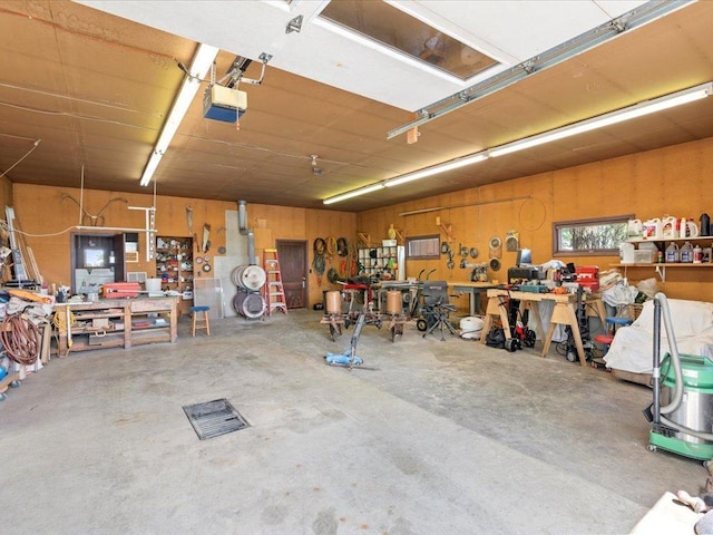 15170 141st Ave, Wadena, MN 56482 - garage with a workshop area and a garage door opener