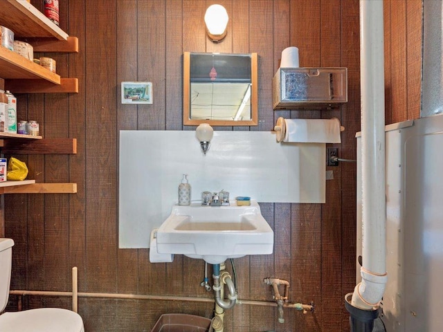 15170 141st Ave, Wadena, MN 56482 - half bathroom with toilet and wood walls