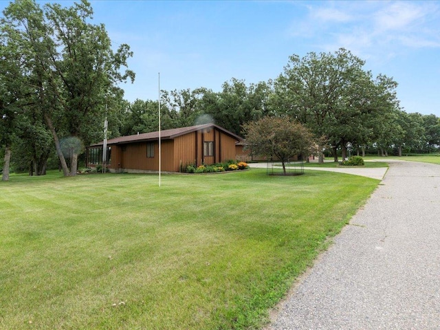 15170 141st Ave, Wadena, MN 56482 - view of property exterior with a yard and view of wooded area