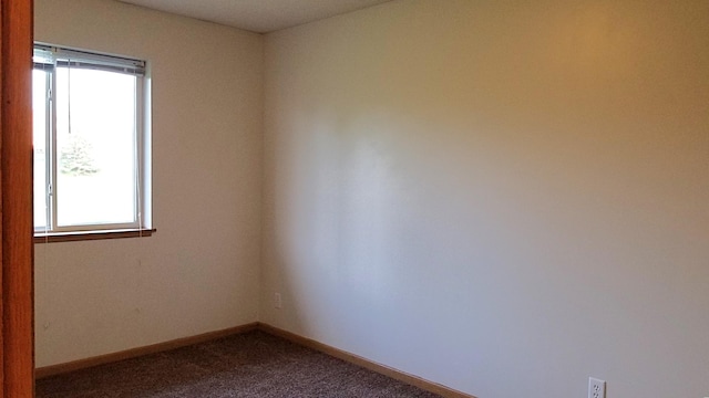 2236 Sacia Ln, Hudson, WI 54016 - unfurnished room featuring dark carpet and baseboards