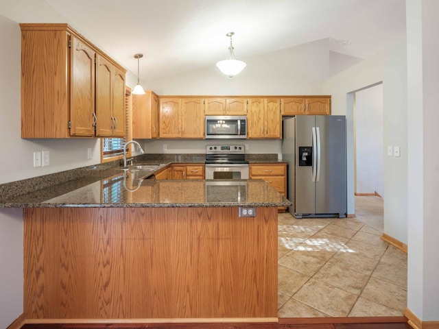 1618 Teton Ct NE, Rochester, MN 55906 - kitchen featuring stainless steel appliances, a peninsula, dark stone counters, lofted ceiling, and decorative light fixtures