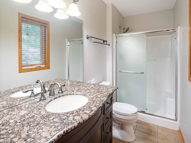 1618 Teton Ct NE, Rochester, MN 55906 - bathroom featuring a stall shower, vanity, and tile patterned floors