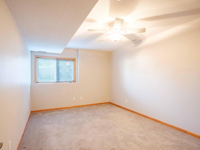 1618 Teton Ct NE, Rochester, MN 55906 - unfurnished room featuring carpet, ceiling fan, and a textured ceiling
