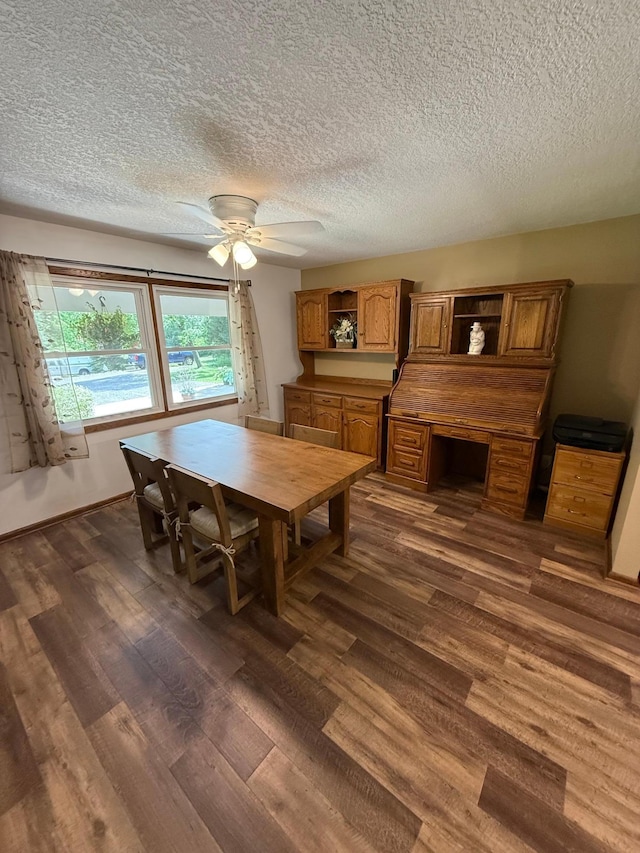 4527 Cushing Ave NW, Buffalo, MN 55313 - dining area with dark wood-style floors, ceiling fan, and a textured ceiling