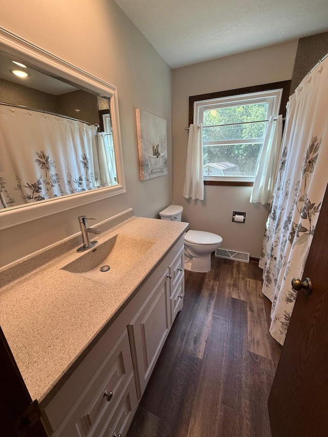 4527 Cushing Ave NW, Buffalo, MN 55313 - bathroom with vanity and wood finished floors