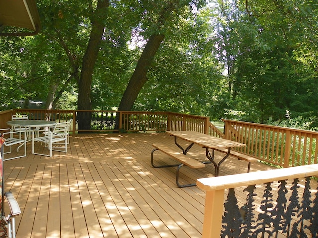 4527 Cushing Ave NW, Buffalo, MN 55313 - wooden deck featuring outdoor dining area