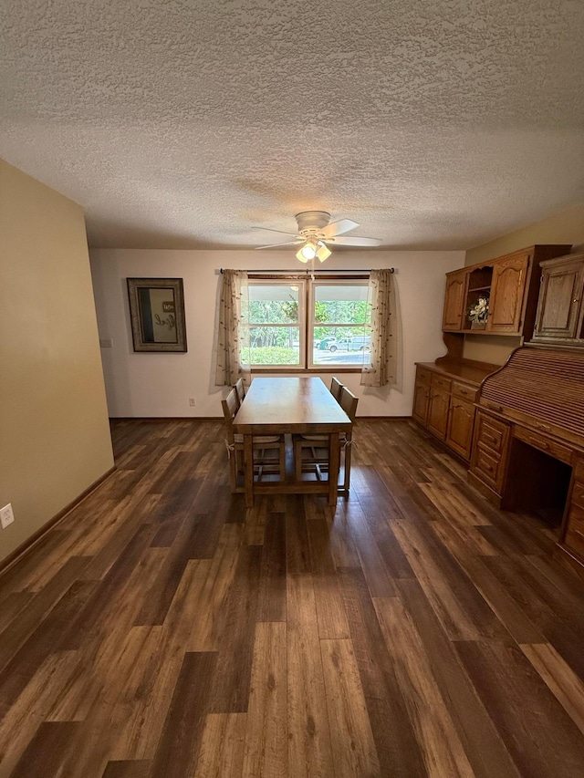 4527 Cushing Ave NW, Buffalo, MN 55313 - dining space featuring dark wood-type flooring, a ceiling fan, and a textured ceiling