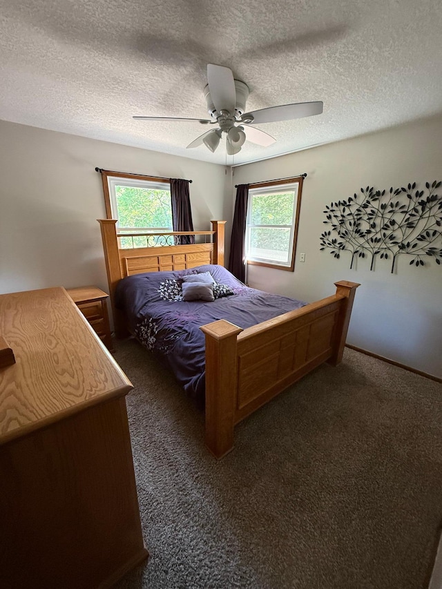 4527 Cushing Ave NW, Buffalo, MN 55313 - carpeted bedroom with a textured ceiling and a ceiling fan