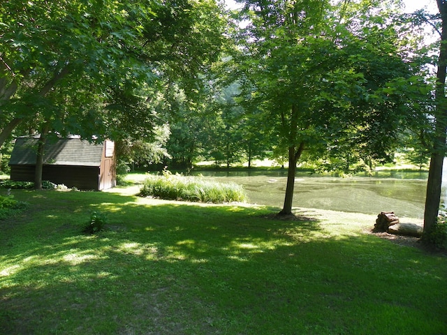 4527 Cushing Ave NW, Buffalo, MN 55313 - view of grassy yard with an outbuilding
