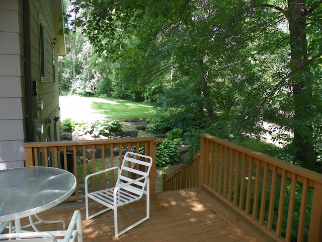 4527 Cushing Ave NW, Buffalo, MN 55313 - wooden deck featuring outdoor dining area