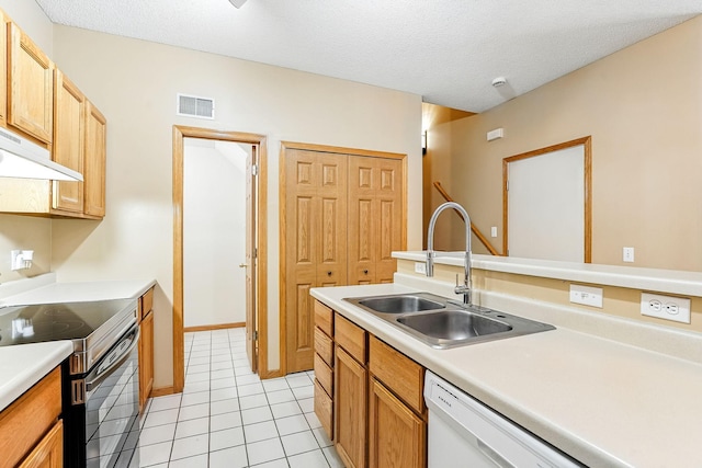 3730 Vermilion Ct S Unit 509, Eagan, MN 55122 - kitchen with stainless steel electric stove, under cabinet range hood, dishwasher, light countertops, and light tile patterned floors