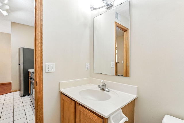 3730 Vermilion Ct S Unit 509, Eagan, MN 55122 - half bath featuring vanity and tile patterned floors